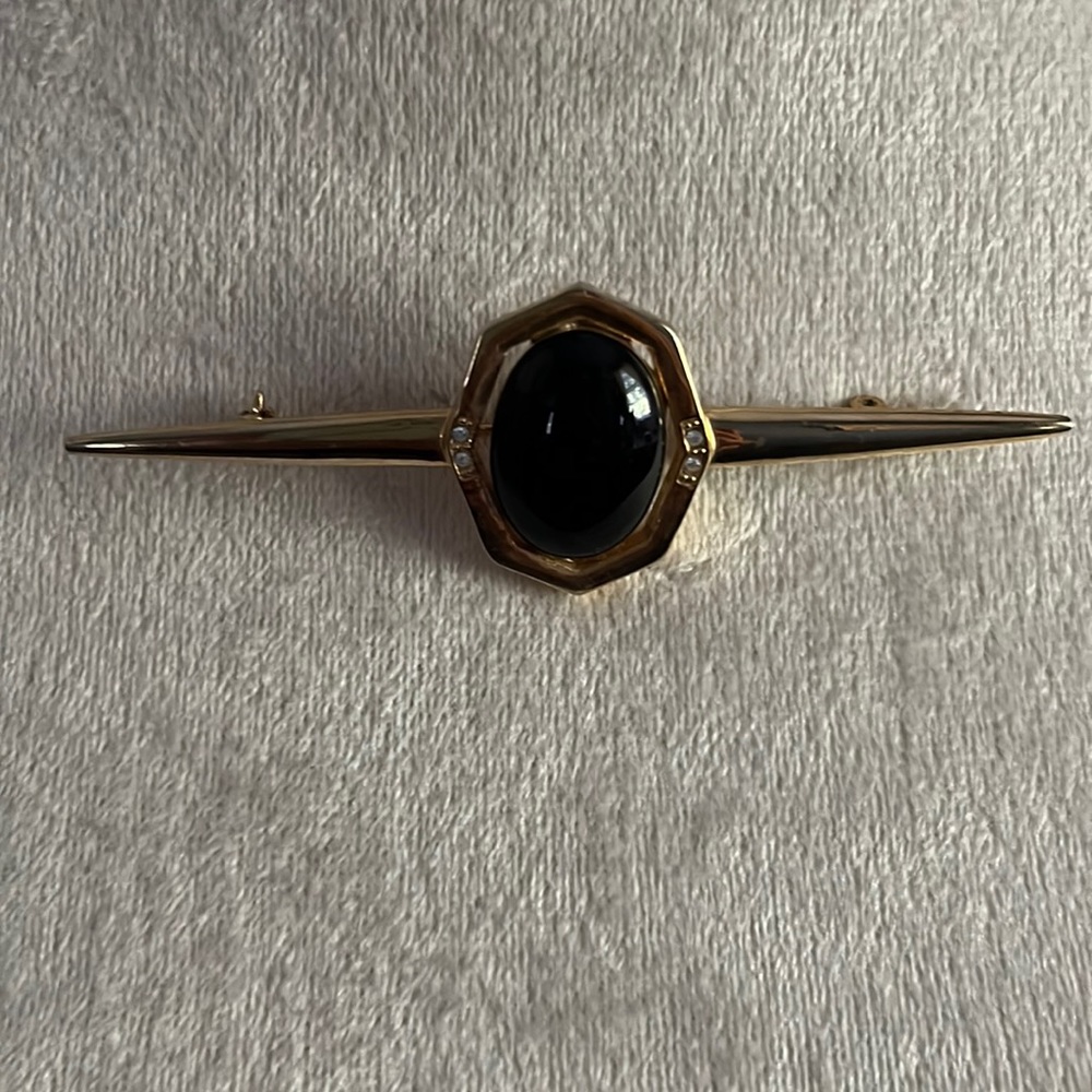Gold Brooches